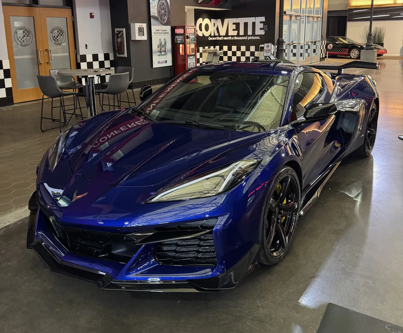 A blue Corvette waiting inside the National Corvette Museum delivery area