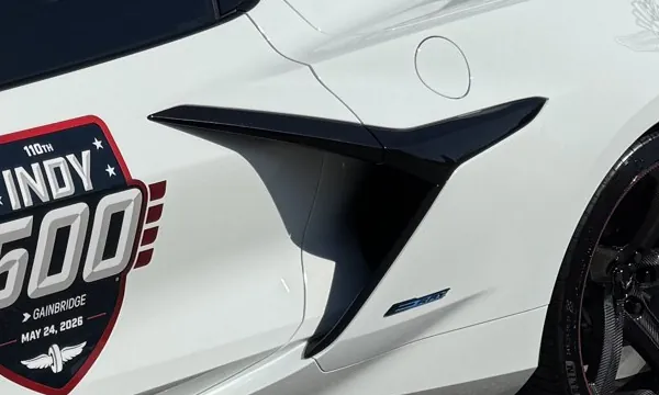 The door blade of a white Corvette Z06 outlined